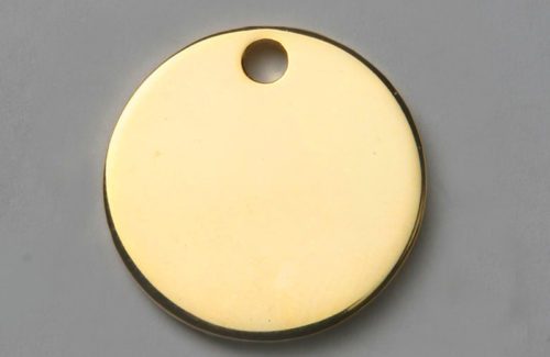 Médaille chien ronde dorée